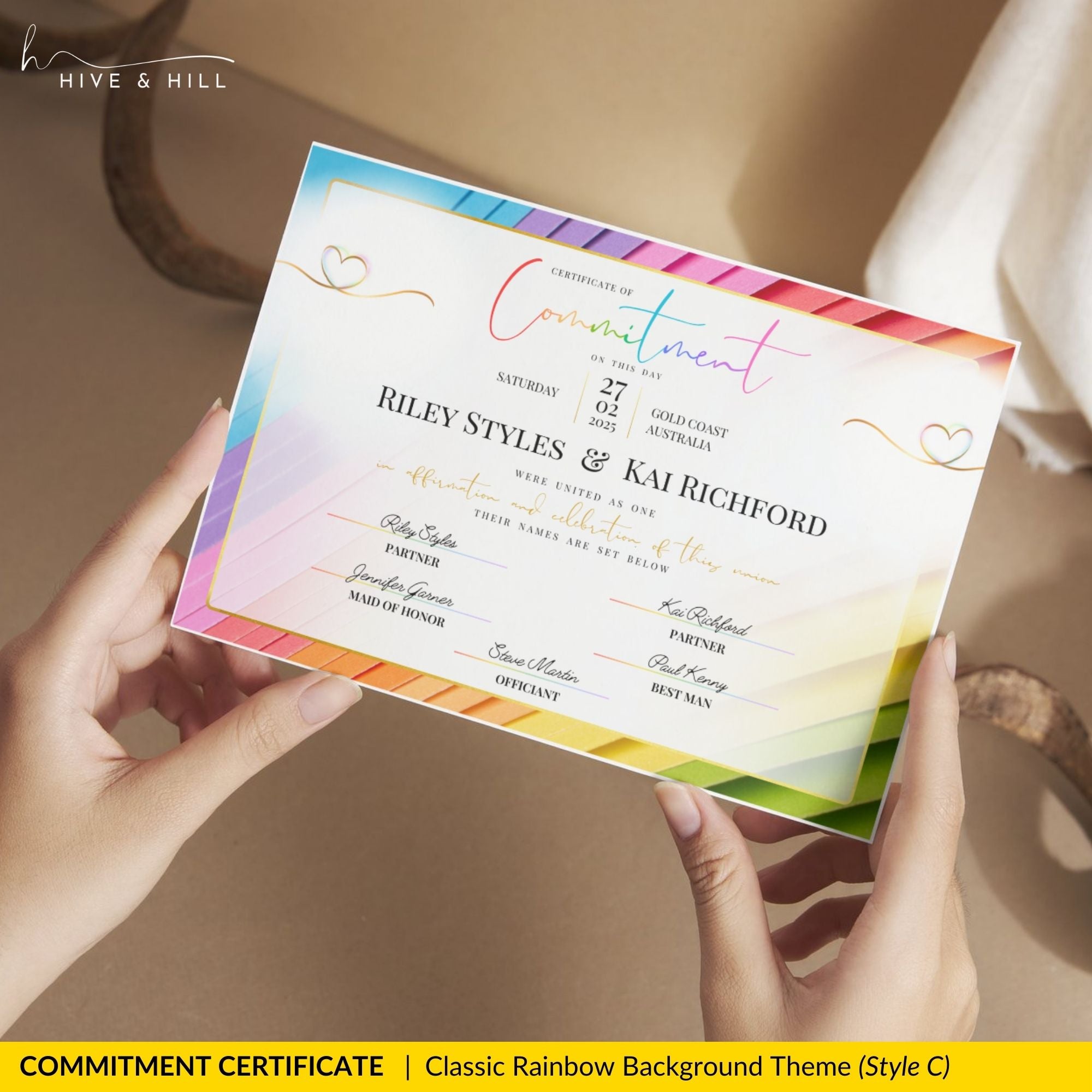 Hands holding landscape pronoun commitment certificate with rainbow border, Hive and Hill.
